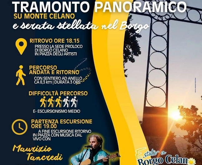 Gruppo di persone cammina su un sentiero di montagna al tramonto, con vista panoramica.
